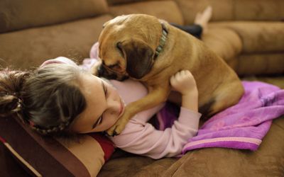 cognitive rest - girl on couch