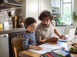 dad with son in house