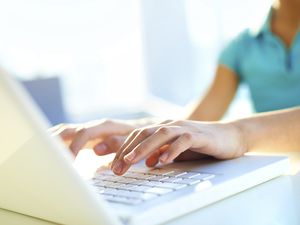Child checking the laptop
