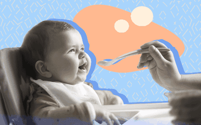 Baby getting spoon-fed