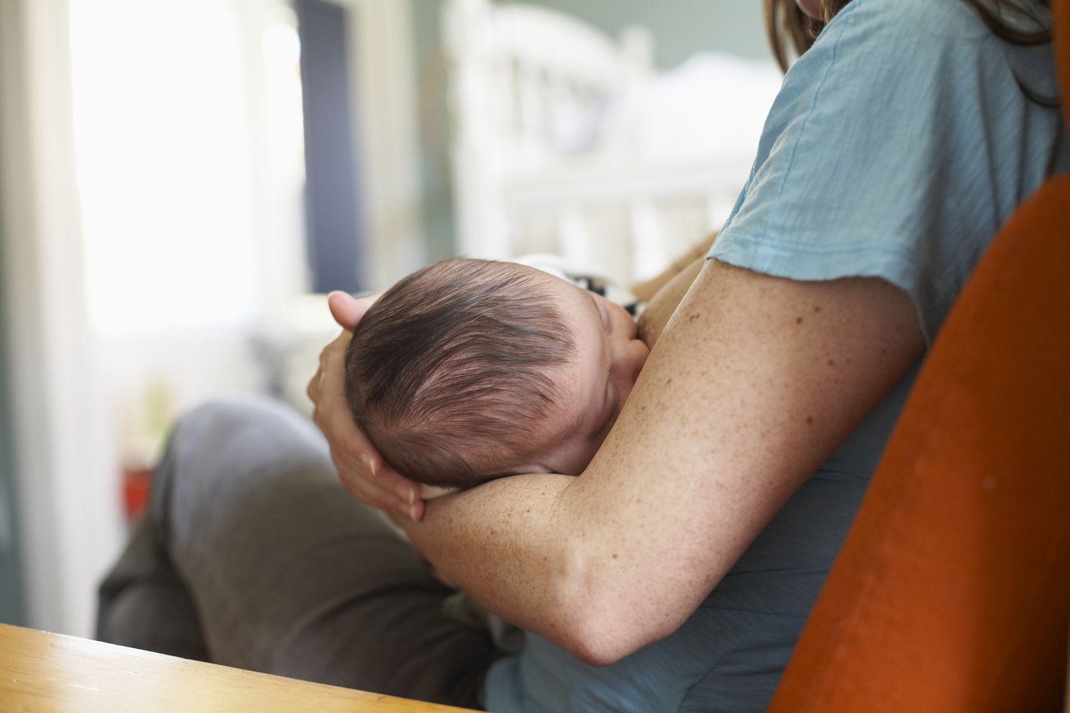Woman breast feeding her baby