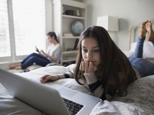 Teen with laptop