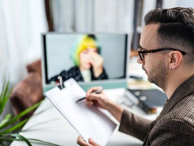 Male psychiatrist in online therapy session with his adhd patient