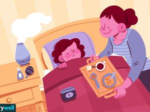 母亲在病床上的孩子感到痛苦