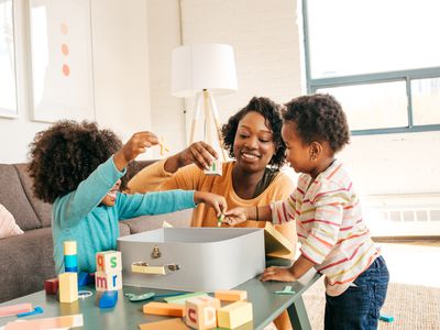 Babysitter playing with children