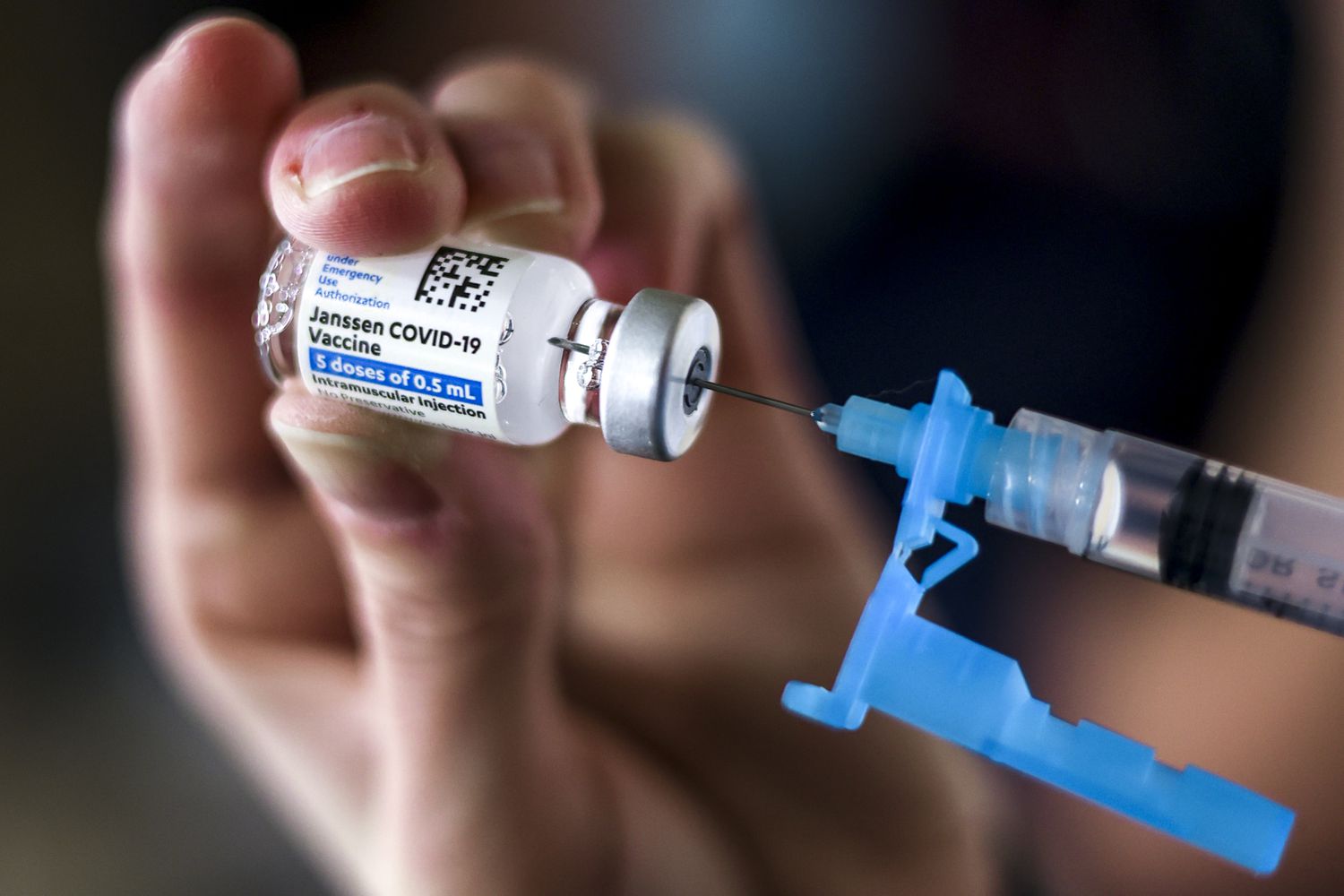 A dose of the Johnson & Johnson COVID-19 vaccine is drawn from a vial