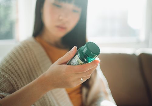 Woman with vitamins