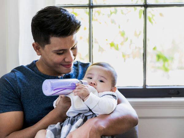 bipoc-man-babysitting-baby