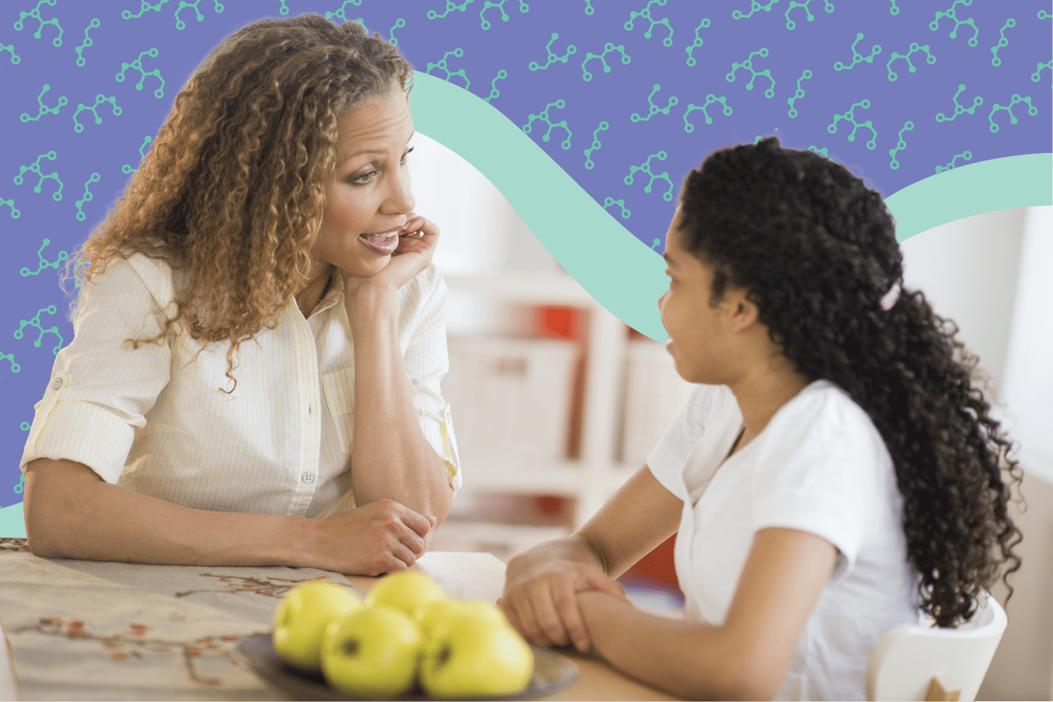 Mother and daughter talking at the table