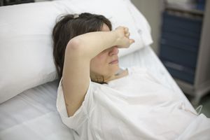 Woman in hospital bed