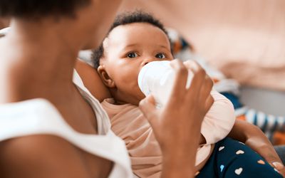 mom feeding baby