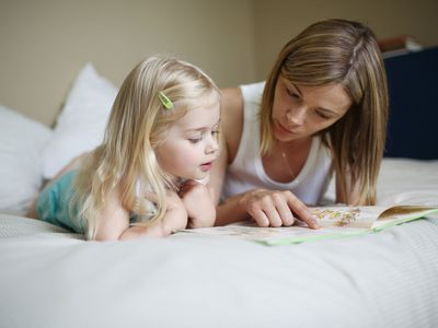 woman and child reading