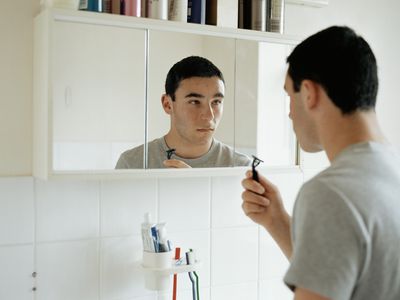 teen boy shaving