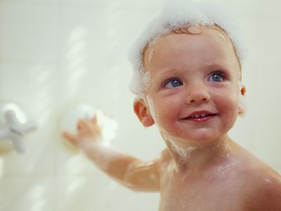 Toddler girl (18-21 months) in bath with shampoo in hair