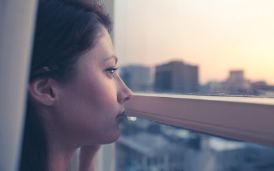 Woman looking out the window