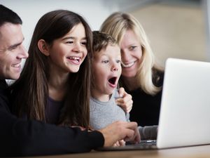 family video chatting on laptop