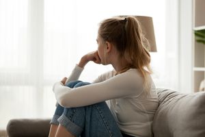 Woman sitting on the couch