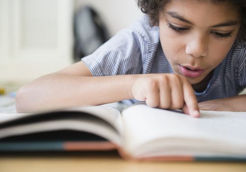 Child reading a book