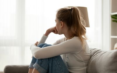 Woman sitting on the couch