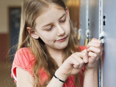 Girl opening a locker