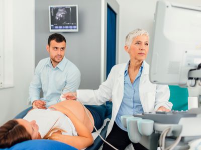 A pregnant woman getting an ultrashound