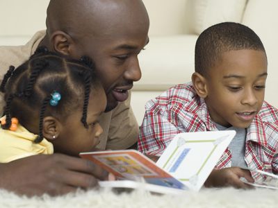 Father reading with his children