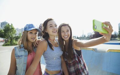 Three teen girls take a selfie