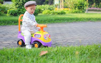 Baby on ride-on toy
