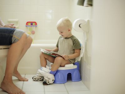 Boy Looking at Picture Book