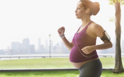 Pregnant woman running