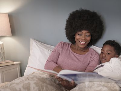 Mother reading to sun