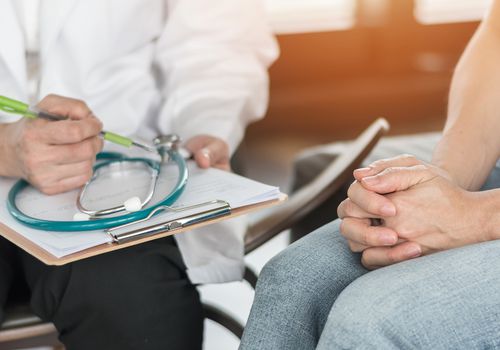 woman with doctor