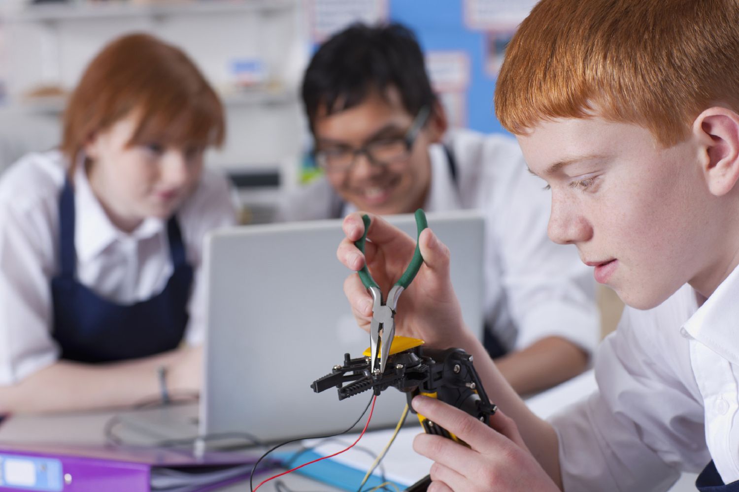 A picture of teens at a robotics camp