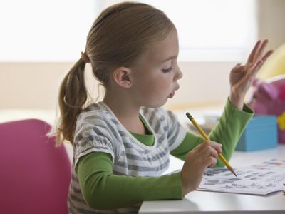 girl doing math homework