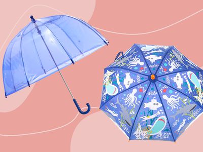 Two umbrellas for kids on a pink background