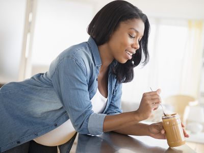 pregnant person eating food
