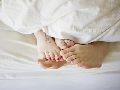 A couple in bed.