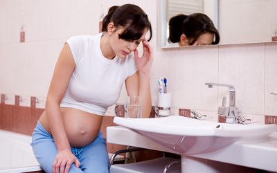 pregnant woman in bathroom