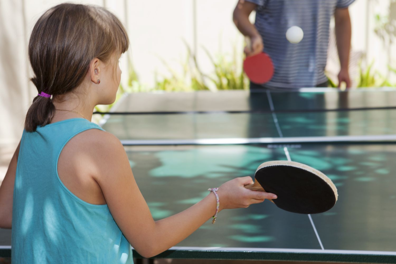 girl playing table tennis