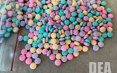 Rainbow-colored fentanyl on display by the Drug Enforcement Administration