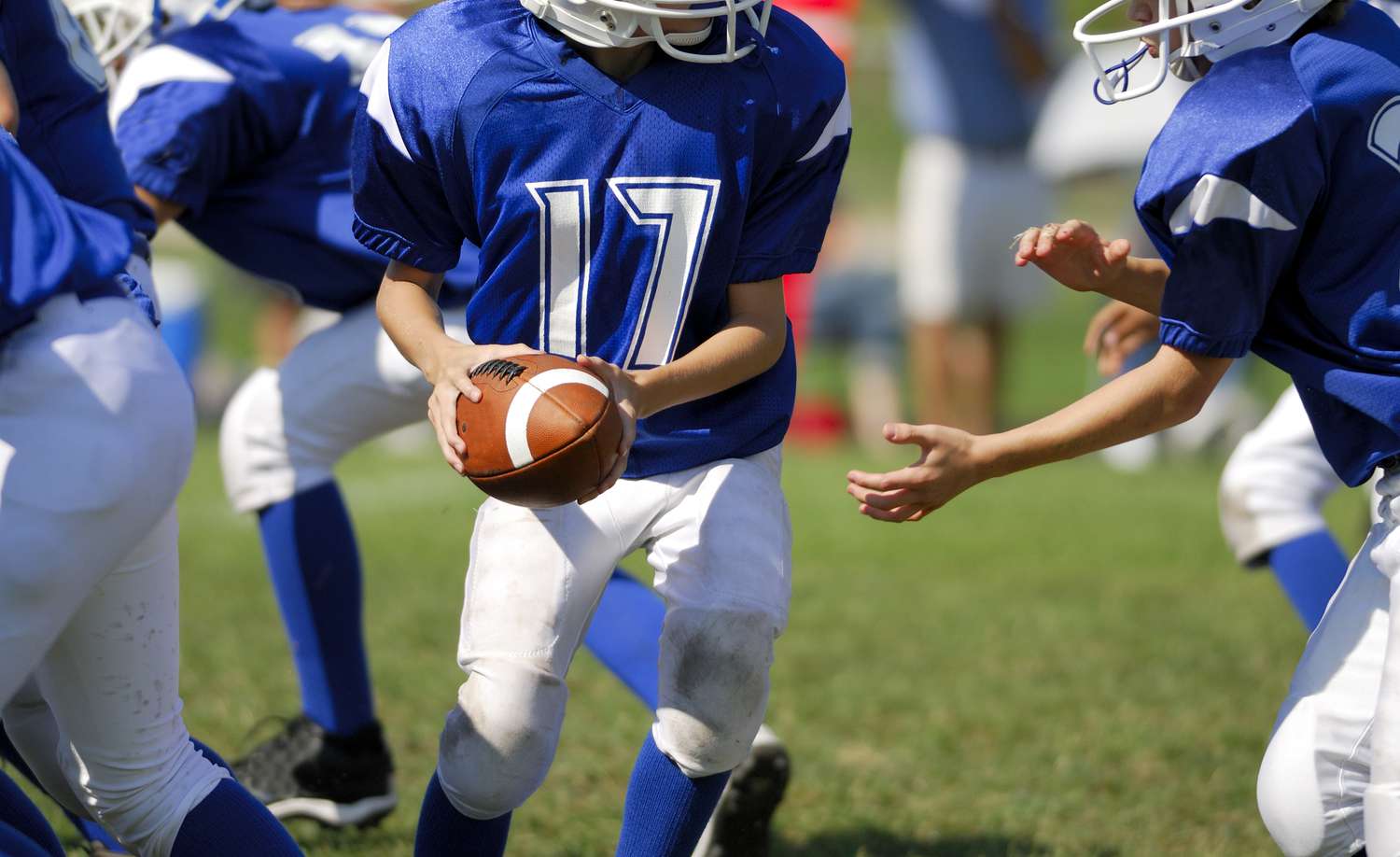 Is football safe for your kid, and is modified tackle the answer?