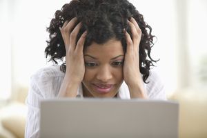 Woman looking up pregnancy information on her computer