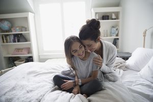 mother hugging child