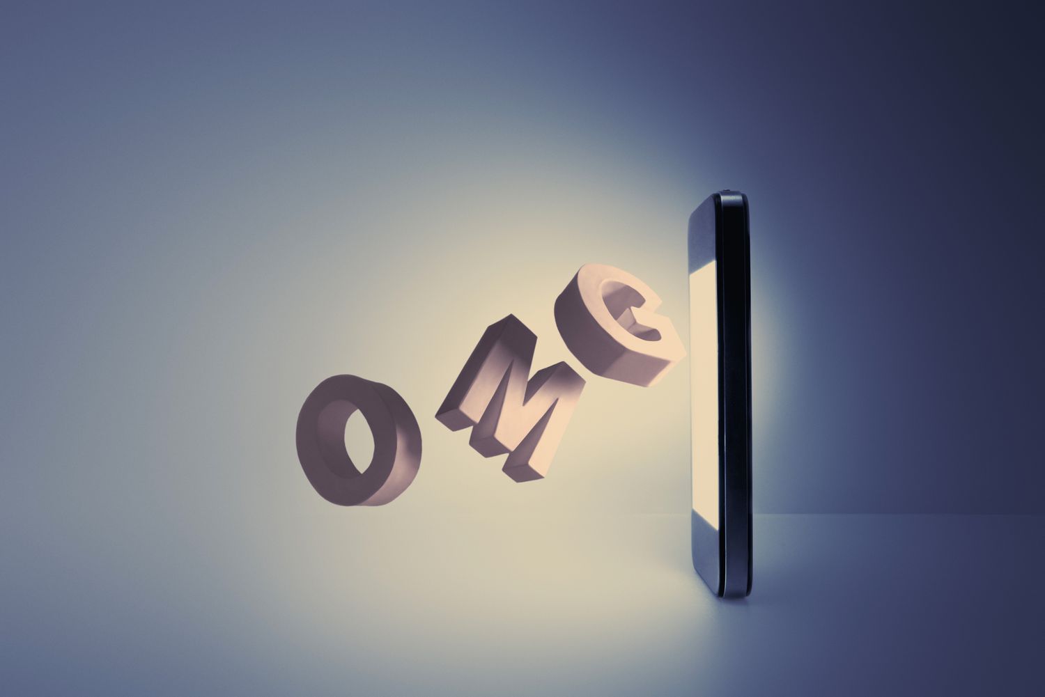 字母OM G coming out from a cell phone screen, acronym you might find in fertility forums and social media sites