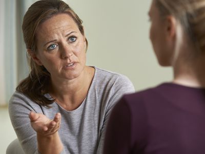 two women discussing bullying