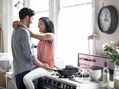 Couple having fun while cooking