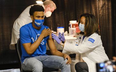 Student getting vaccinated