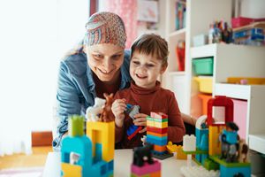 mom with cancer playing with daughter
