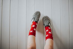 Kid wearing Vans sneakers