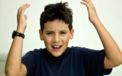 Boy complaining about something